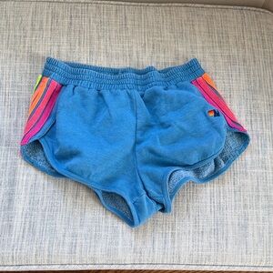 Aviator Nation Blue Shorts with Rainbow Stripes